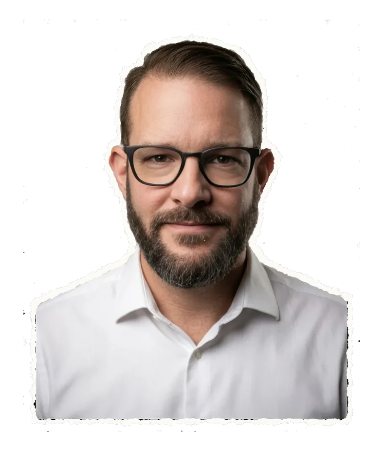 Portrait of Mike Victorick in a white collared shirt, with glasses and a beard, shifting between a neutral look, a smile, a shout and a raised eyebrow.